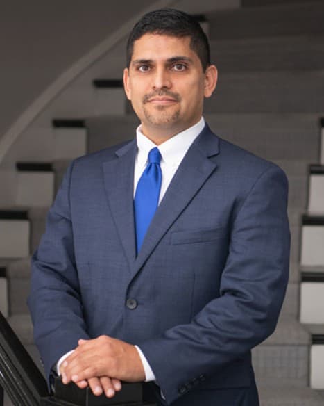 Olegario C. Estrada at the office