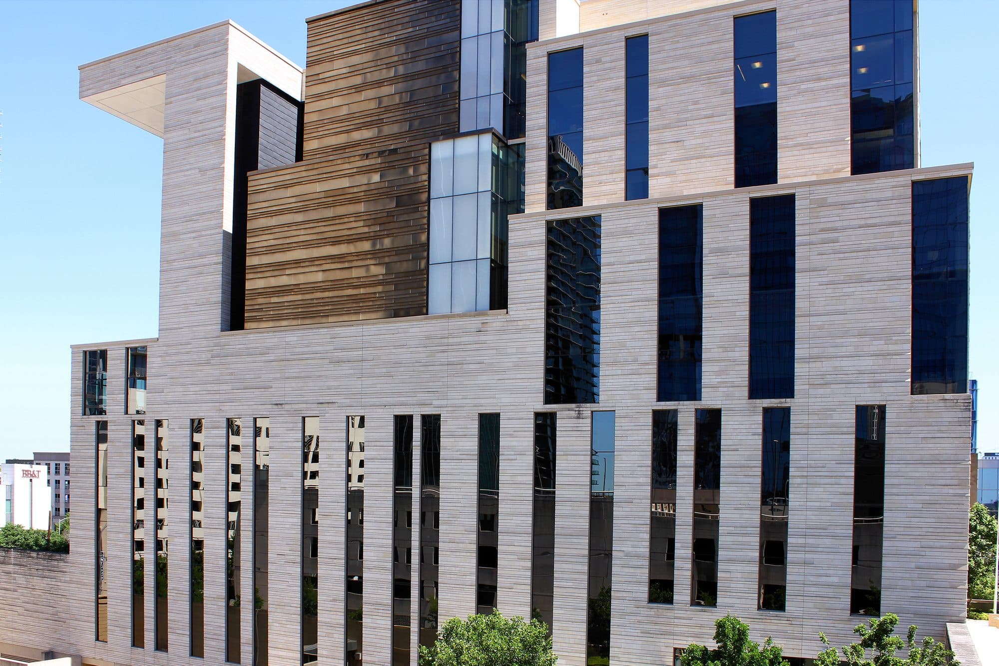 The stone and glass facade of the federal courthouse in Austin, Texas.